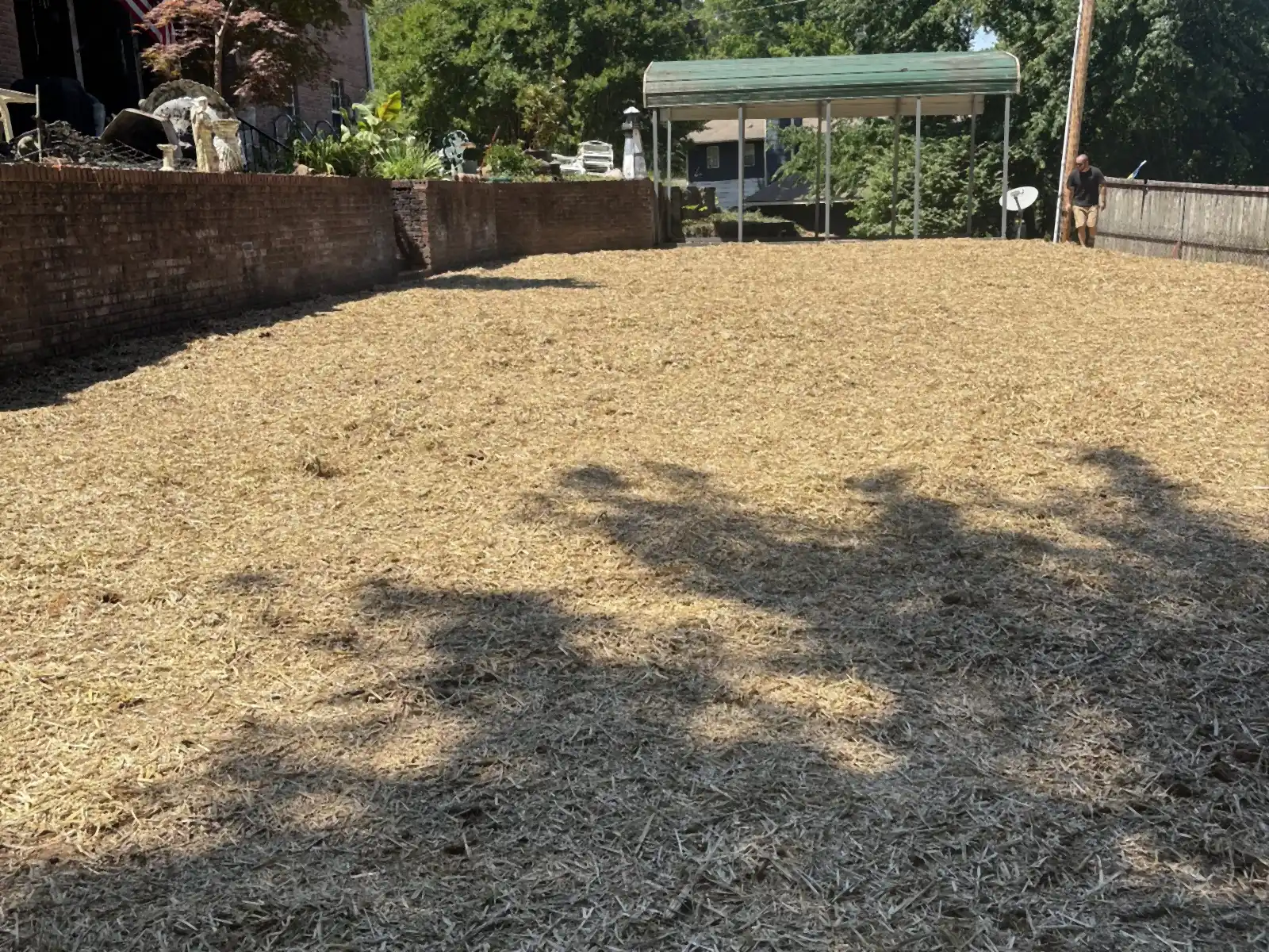 Cleared and graded gravel pad after a demolition job