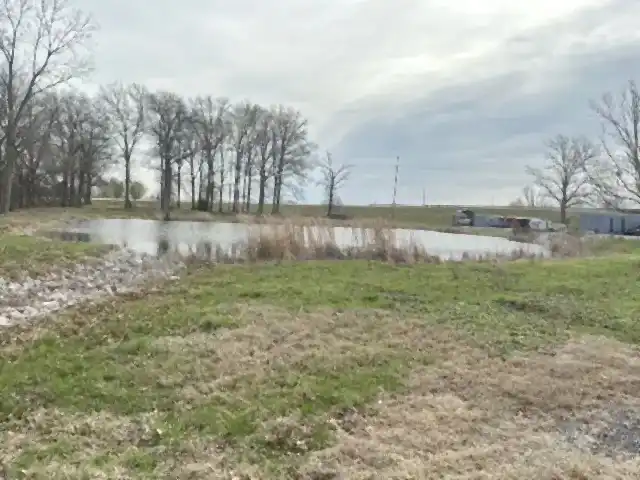 Pond and cleared field on a rural property