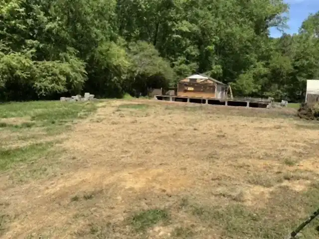 Cleared residential lot after demolition and grading