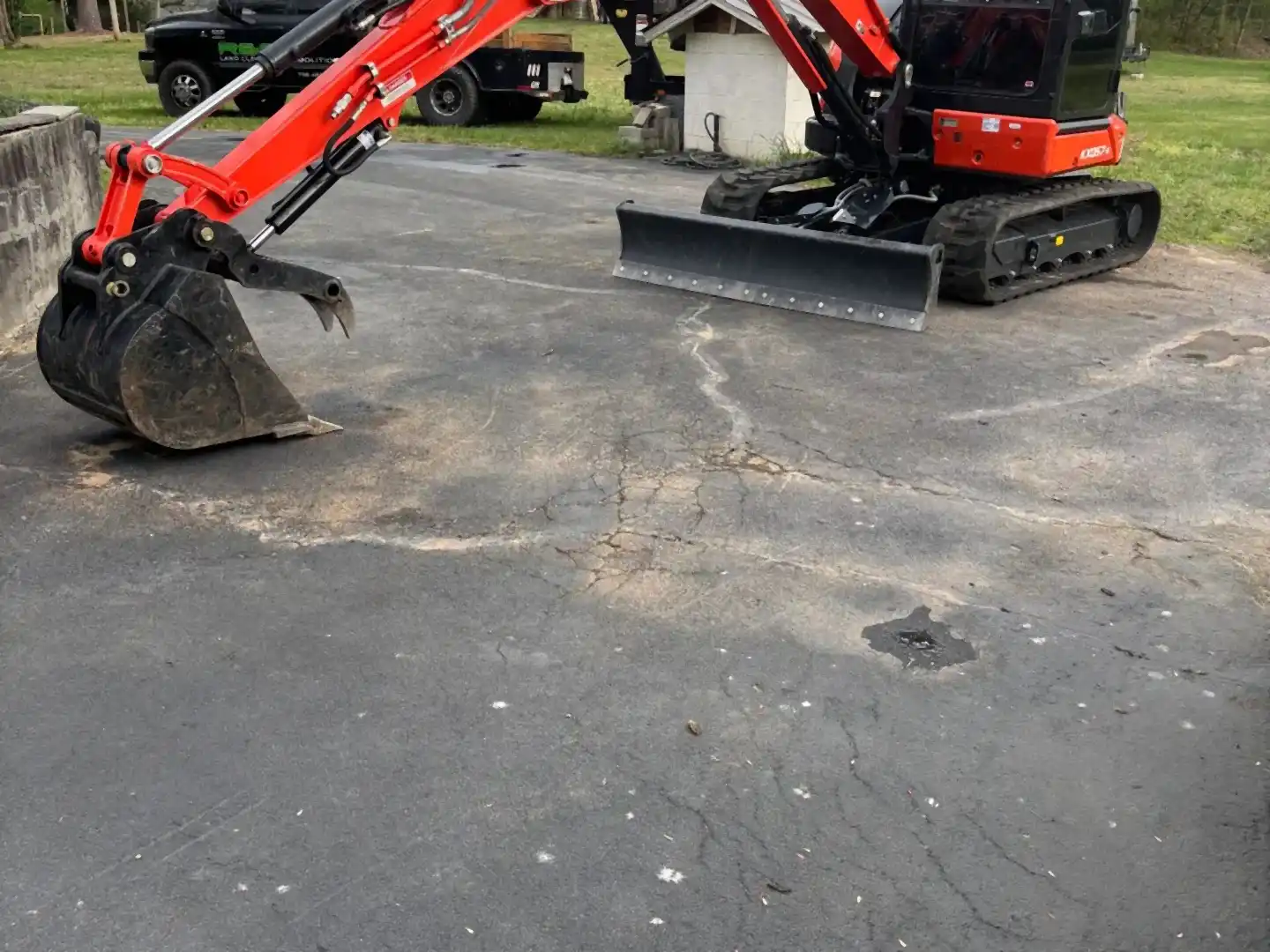 Kubota excavator on a driveway