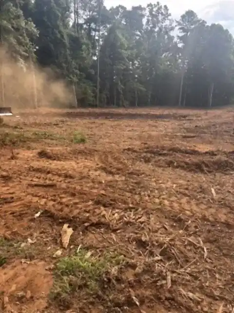 Final grading on a cleared lot, R&G Land Clearing