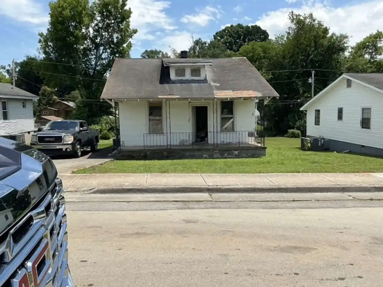 Small bungalow seen from the street before demolition, R&G Land Clearing