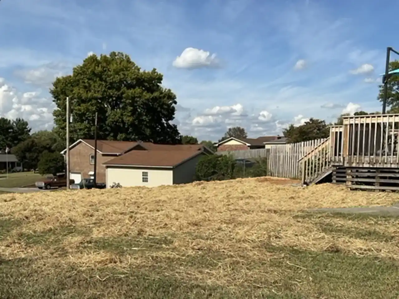 After: In-ground pool before removal and the backfilled, graded yard after, by R&G Land Clearing