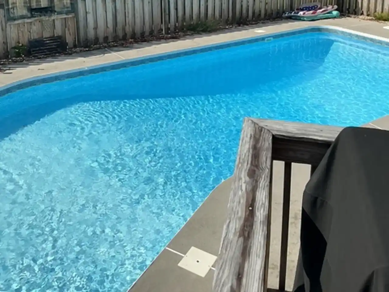 Before: In-ground pool before removal and the backfilled, graded yard after, by R&G Land Clearing